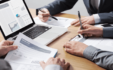 Professional services consultants working on report